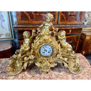 PENDULE DE CHEMINEE DE STYLE LOUIS XV " L’ENFANT BACCHUS, DIONYSOS DIEU GREC DES VENDANGES"