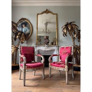 Paire de fauteuils d’époque Empire en bois laqué et doré début XIX ème 