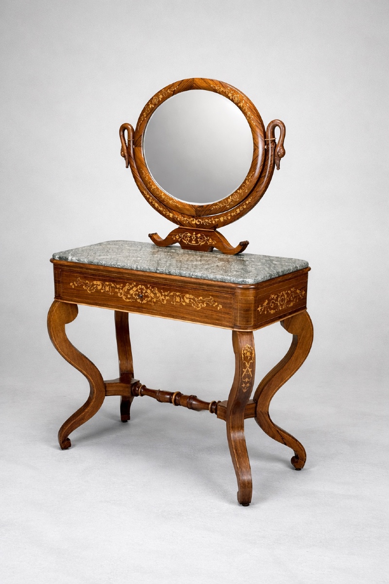 Coiffeuse d'époque Charles X en placage de palissandre ouvrant sur un écritoire