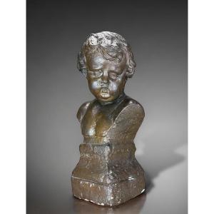 Limestone Bust Representing A Putto After A Model By François Duquesnoy