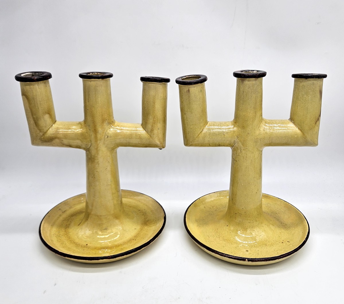 Etienne Noel: Pair Of Modernist 3-branch Varnished Earthenware Candlesticks
