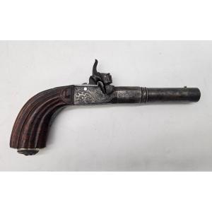 Pistolet à coffre à balle forcée décoré tête de Bacchus 19ème