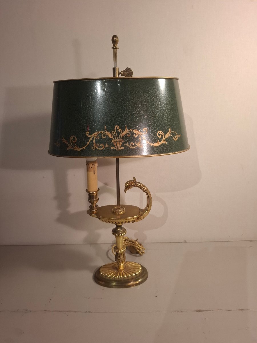 Lampe bouillotte en bronze doré à tête de griffon, époque XXème siècle.