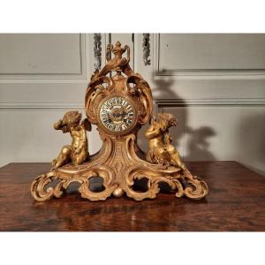 Bronze Clock With Cherubs Louis XV Style, XIXth Century.