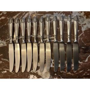 11 couteaux à dessert . Manches en argent fourré ,  800/1000 .  Italie .  Orfèvres Clementi 