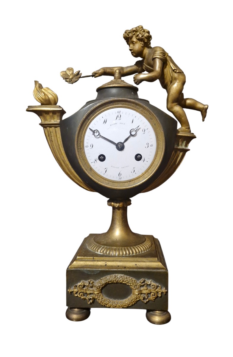 Horloge amour et papillon en bronze époque Empire