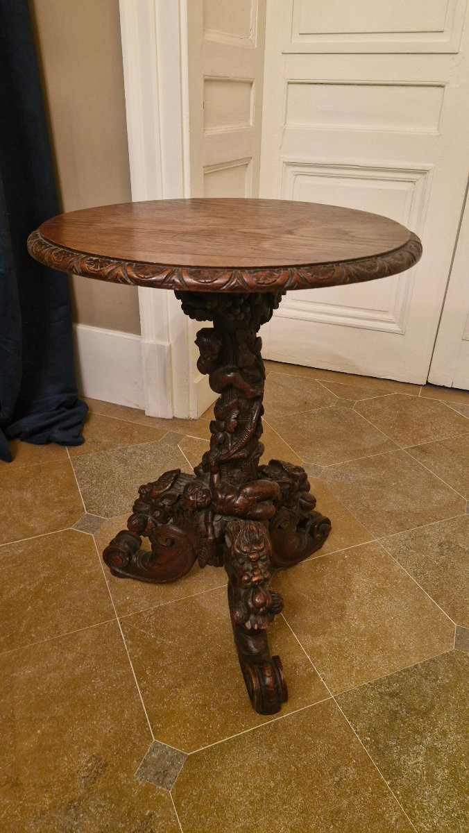 A Carved Wooden Side Table In The Renaissance Style, Decorated With Cherubs. -photo-2