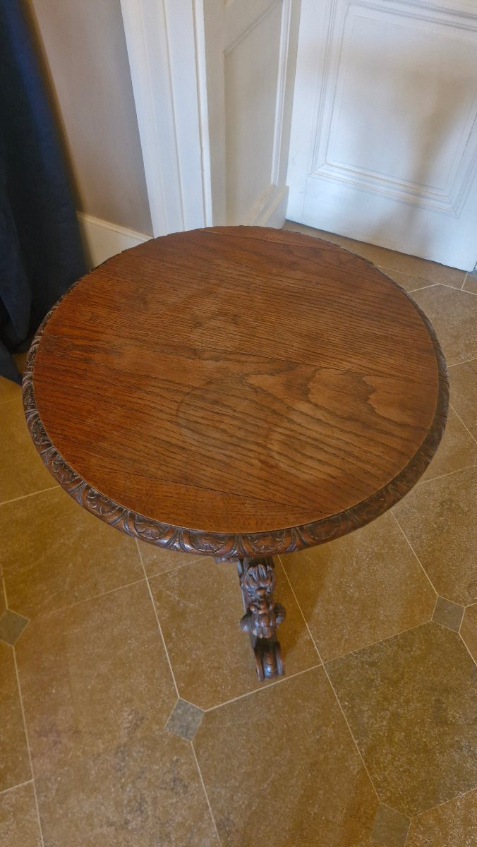 A Carved Wooden Side Table In The Renaissance Style, Decorated With Cherubs. -photo-3