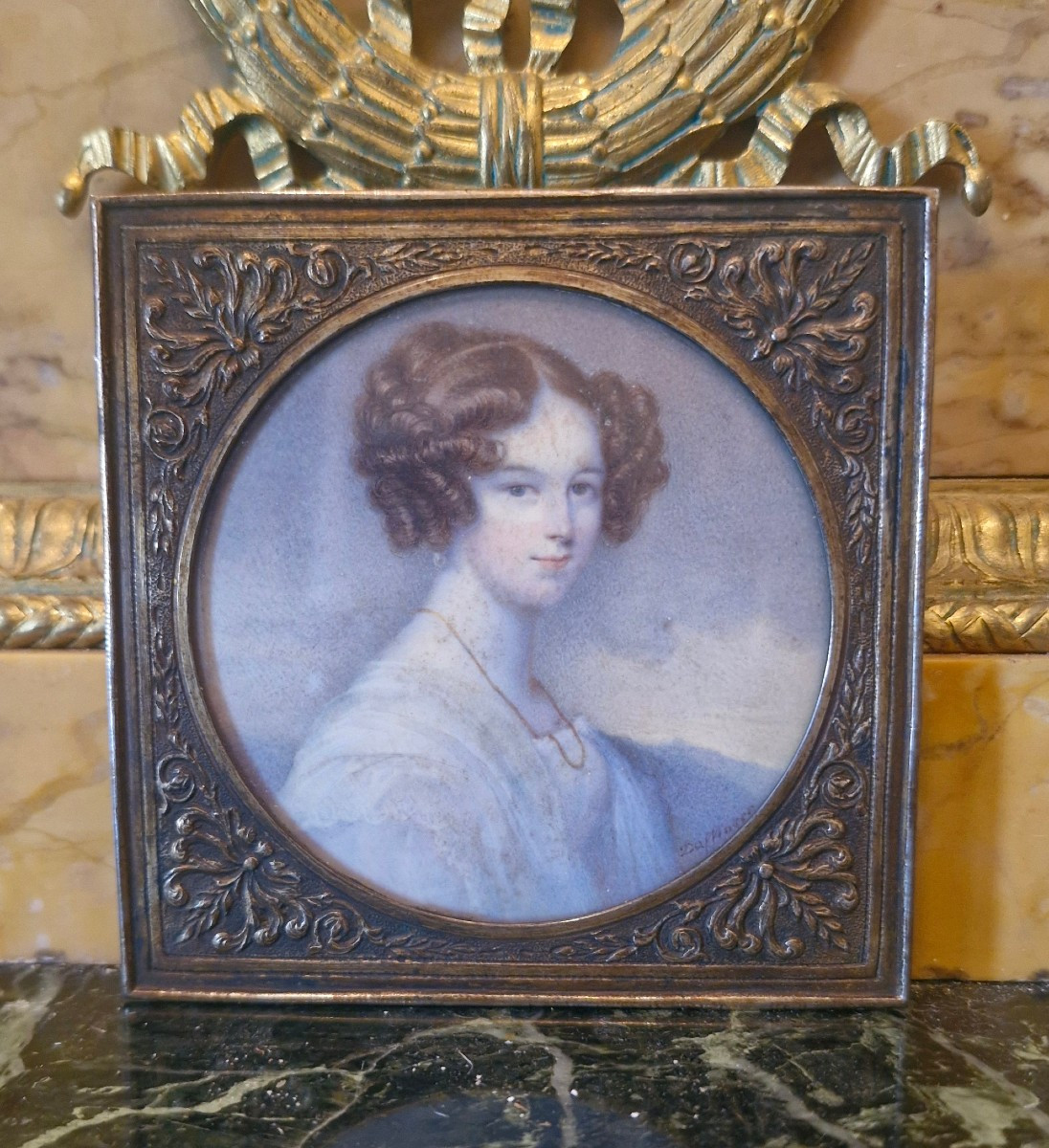 Round Miniature Of A Woman
