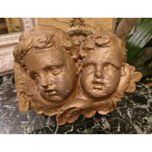 Têtes d'ange en bois sculpté doré