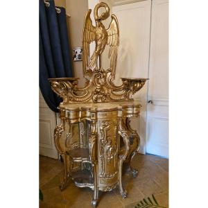 Console en bois doré à décor d'aigle