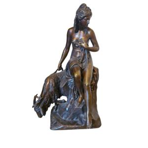 Sauvage, sculpture en bronze représentant une femme et une chèvre 