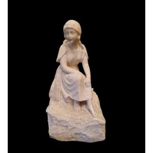 An Alabaster Sculpture Depicting A Young Girl