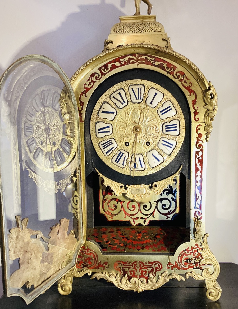 Pendule en marqueterie Boulle, écailles de tortue et bronze doré.-photo-1
