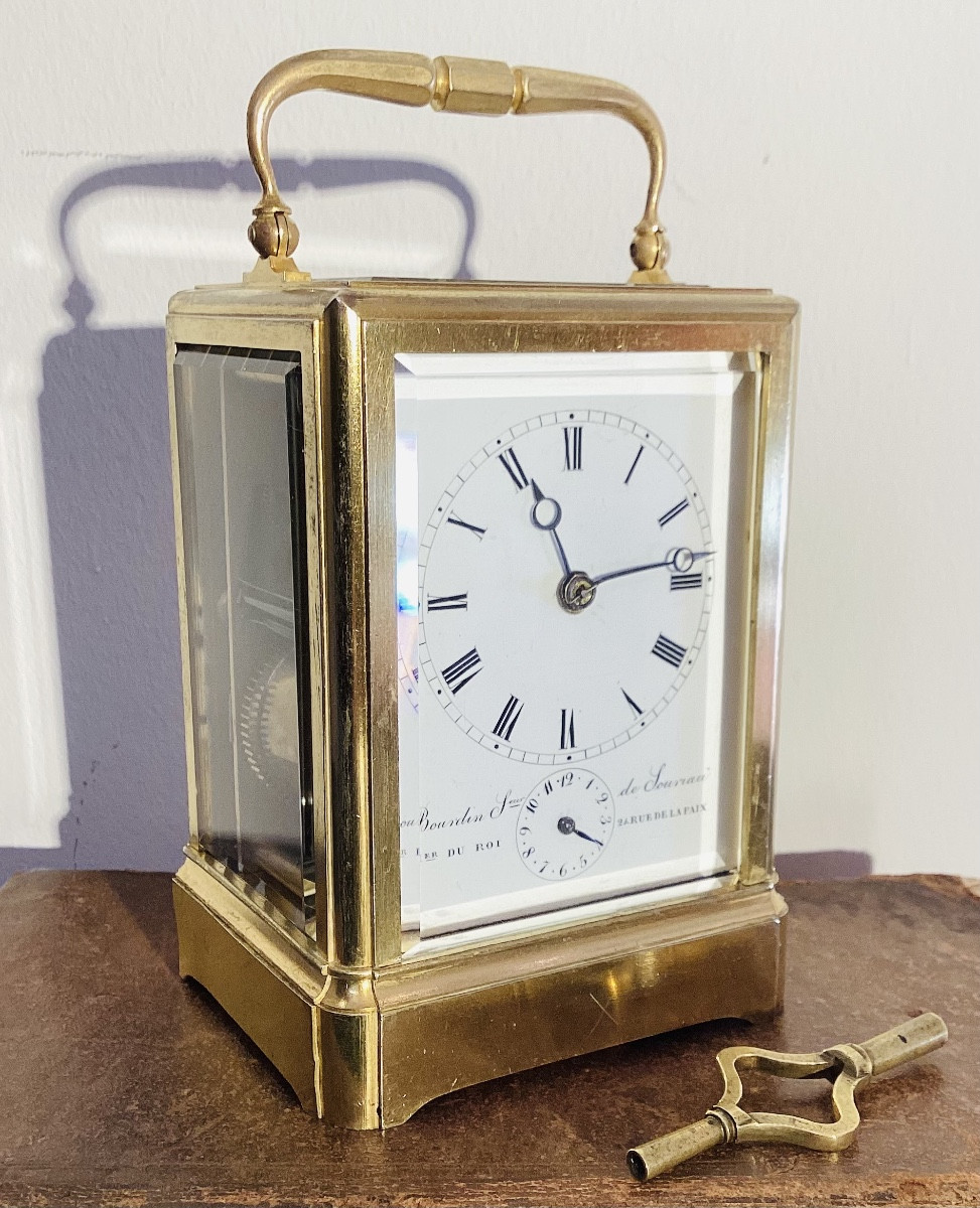 Pendulette de voyage en laiton doré signée Bourdin.