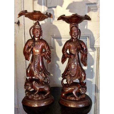 Pair Of Asian Topics In Carved Wood.