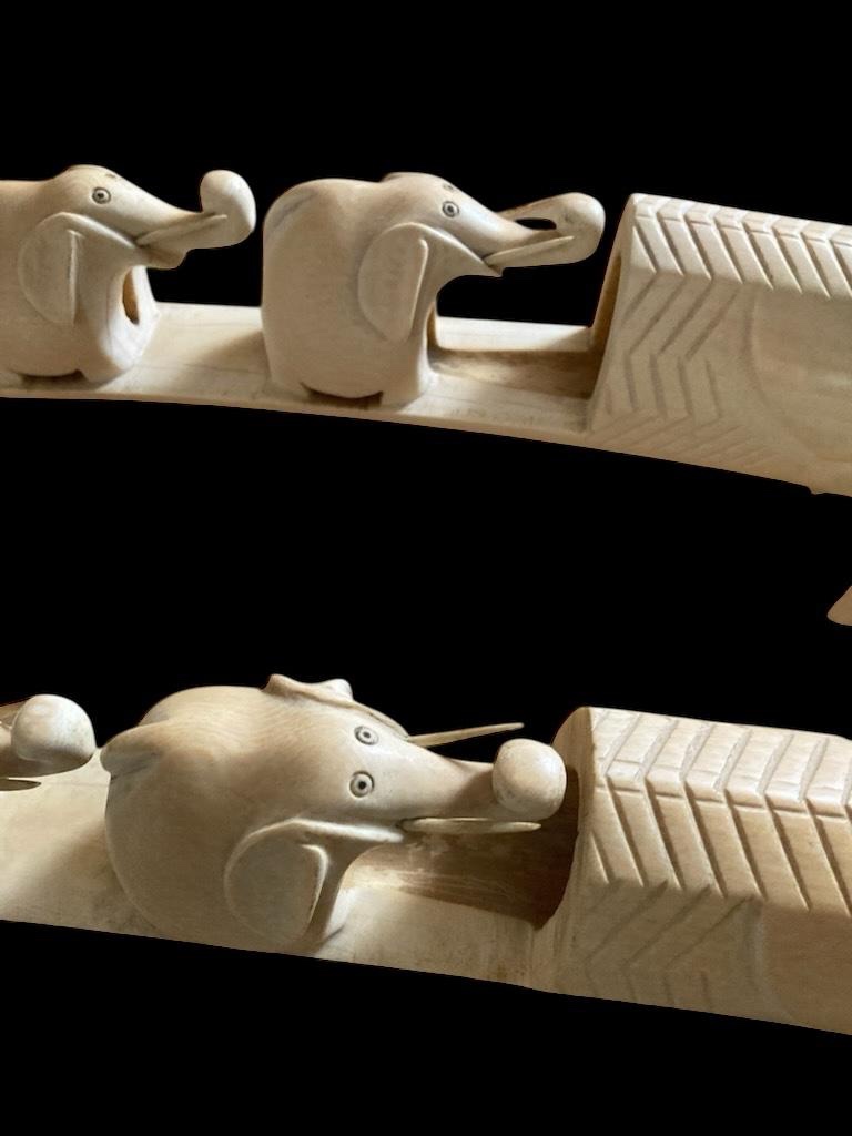 Pair Of Elephant Ivory Tusks. Seven Elephants And A Crocodile's Mouth. Length 77cm. Cites