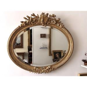 Grand miroir ovale de style Louis XVI. 110 x 97 cm.  La Rochelle . XIX° 