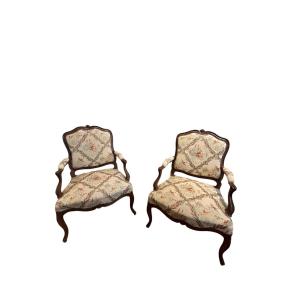 A Pair Of Louis XV Armchairs. Queen-style Backrest In Molded Beech.