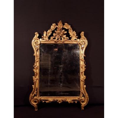 Miroir En Bois Doré d'époque Louis XV.