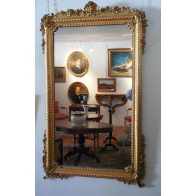 Miroir  en bois doré à la feuille,transition LXV-LXVI,époque XIXème