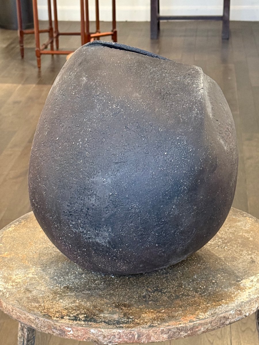 Large Black Ceramic Piece Shaped Like A Vase Or Sculpture -photo-2