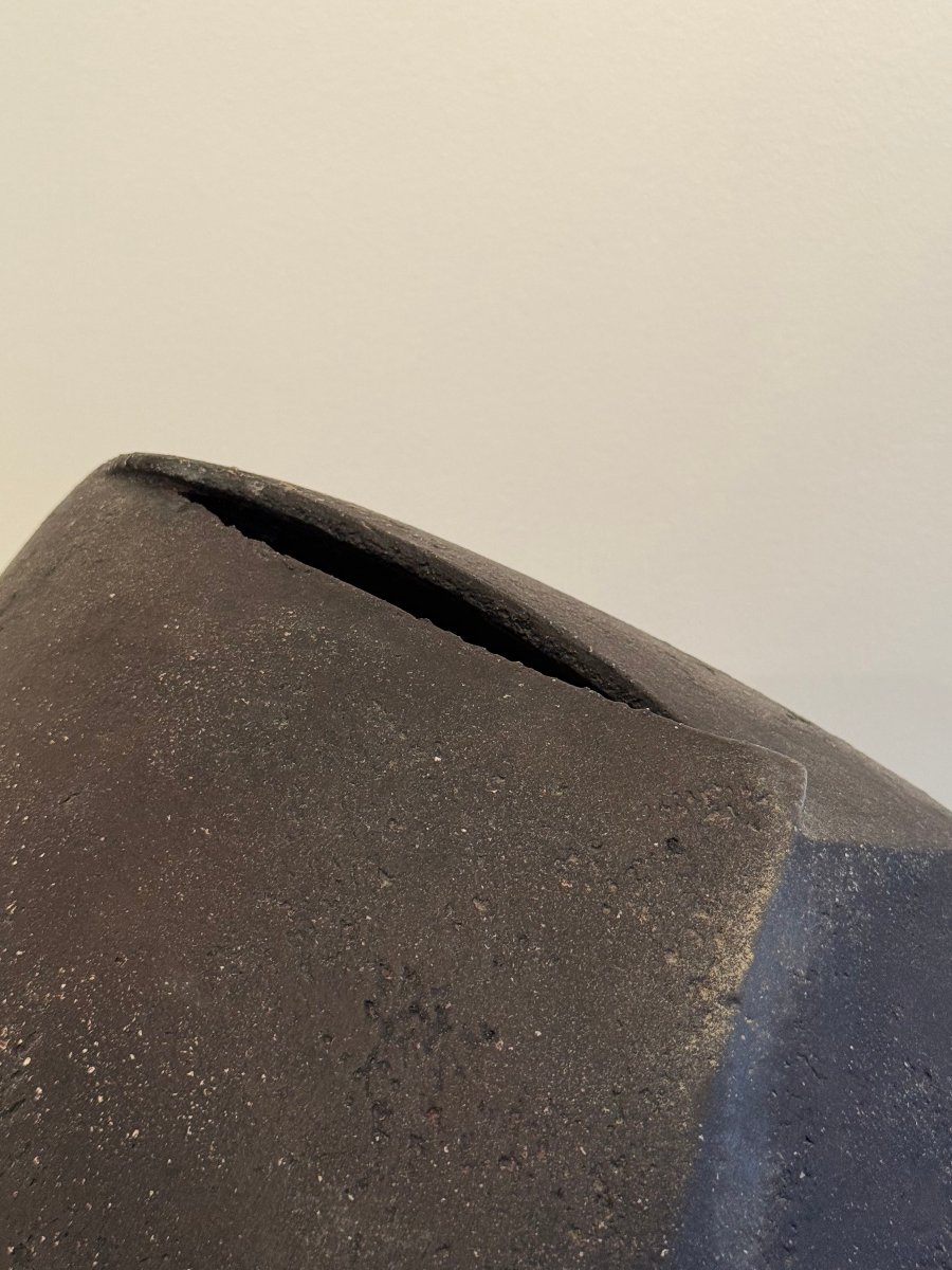 Large Black Ceramic Piece Shaped Like A Vase Or Sculpture -photo-3