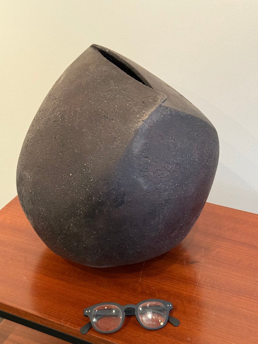 Large Black Ceramic Piece Shaped Like A Vase Or Sculpture -photo-4
