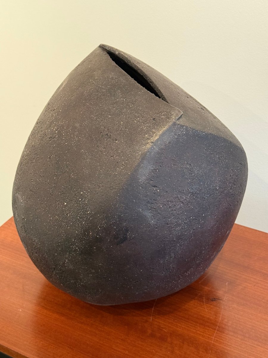 Large Black Ceramic Piece Shaped Like A Vase Or Sculpture -photo-5