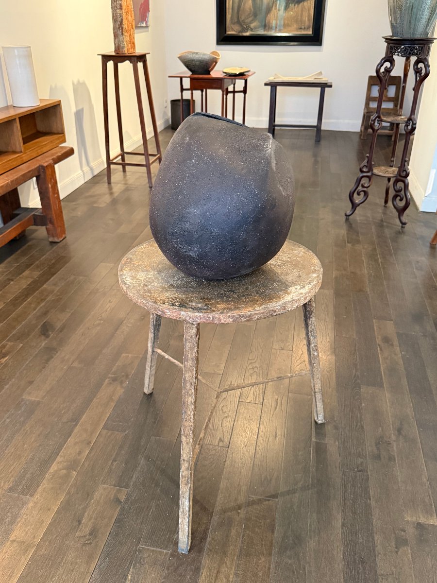 Large Black Ceramic Piece Shaped Like A Vase Or Sculpture 