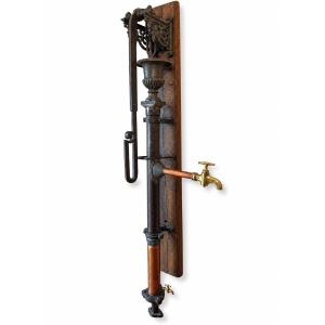 Large Wall-mounted Water Pump Made Of Cast Iron, Copper, And Brass, With A Medici Vase, Circa 1850