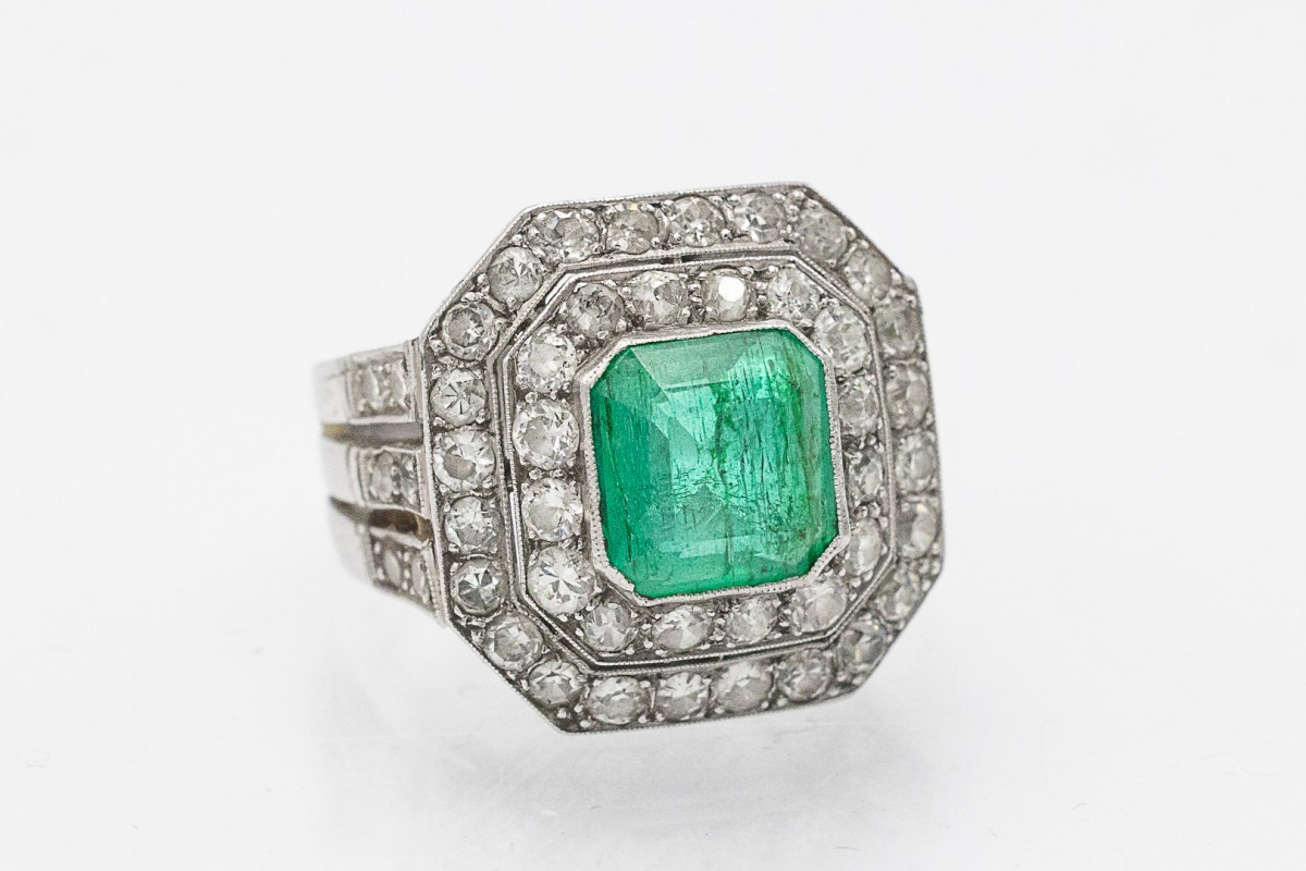 A Unique Signet Ring With An Impressive Emerald And Diamonds.