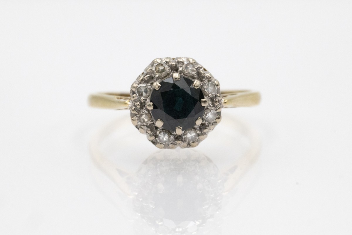 Classic Gold Ring With Round Sapphire And Diamonds, United Kingdom, London, 1960s.