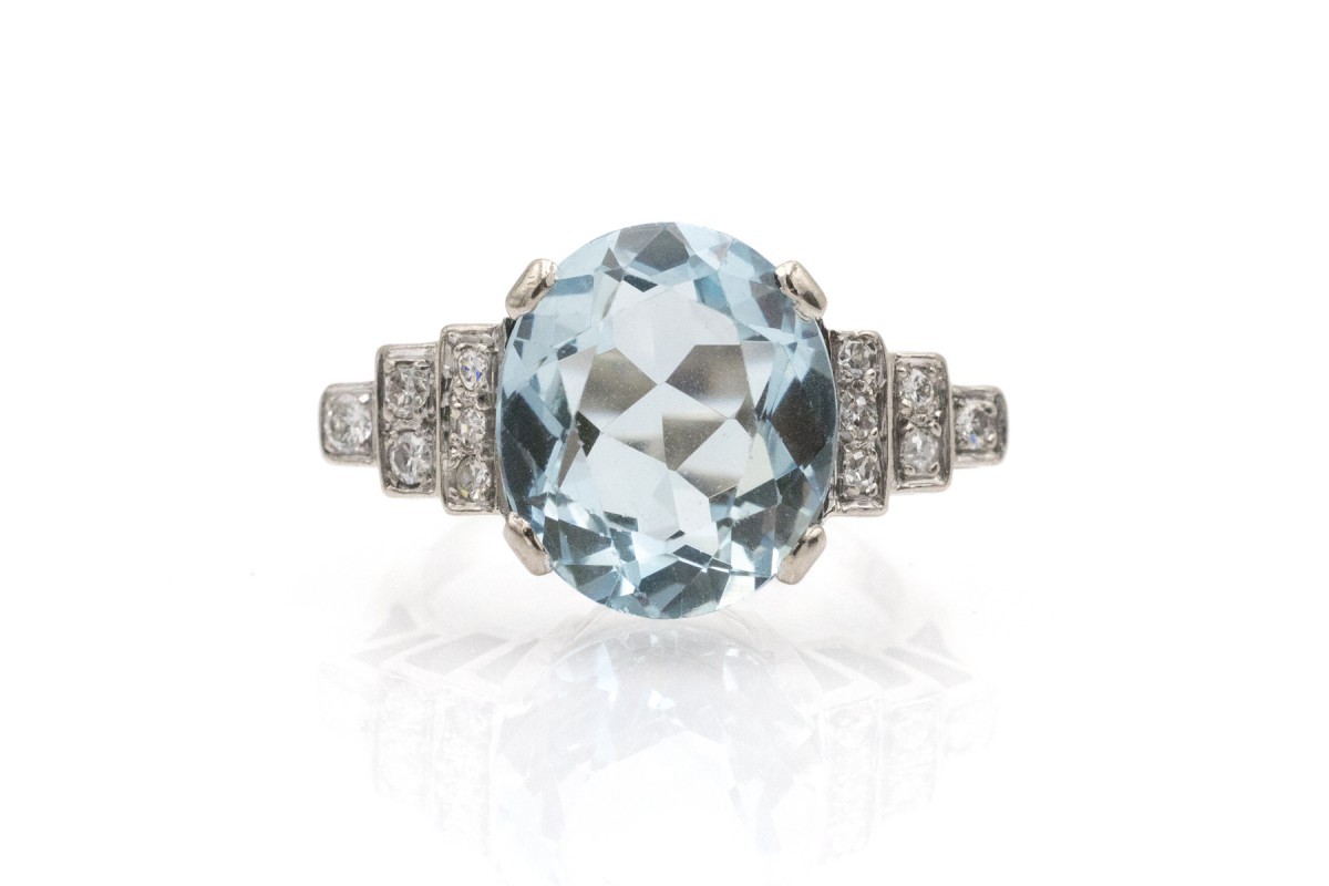 A Unique Ring Adorned With Aquamarine And Diamonds