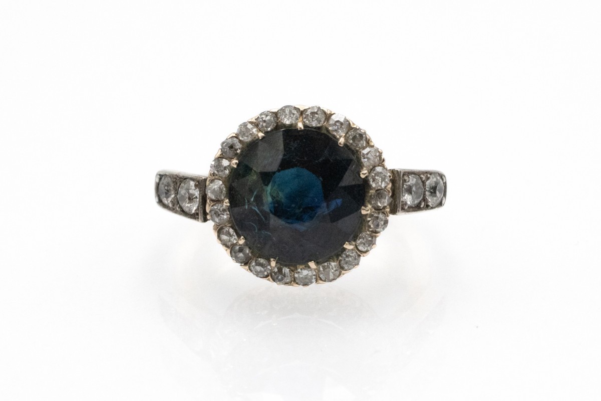 Antique Gold Ring Adorned With A Sapphire And Impressive Diamonds, Early 20th Century.