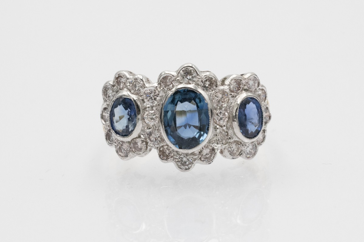 Elegant Gold Ring For Women, Adorned With Sapphires And Diamonds.