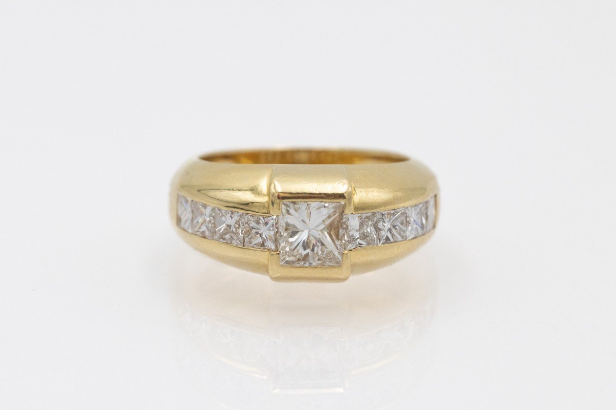 Stunning 18-karat Gold Ring Set With Princess-cut Diamonds, France.