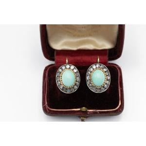 Boucles d'oreilles uniques en or ornées d'éléments en argent, de diamants et de turquoise