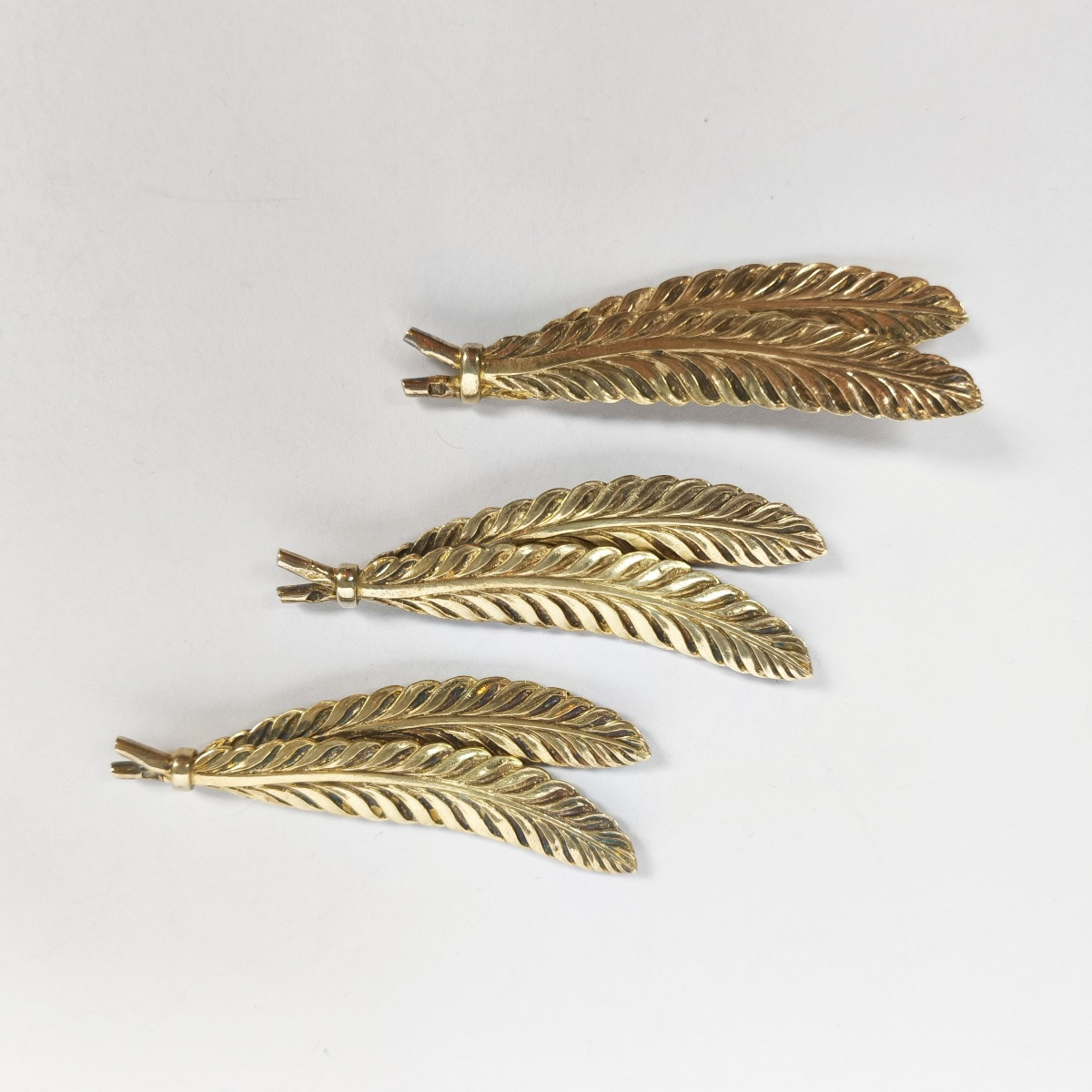 Odiot : trois porte-couteaux Plume en argent massif vermeil. XXe siècle. -photo-3