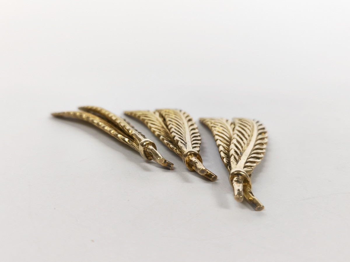 Odiot : trois porte-couteaux Plume en argent massif vermeil. XXe siècle. -photo-2