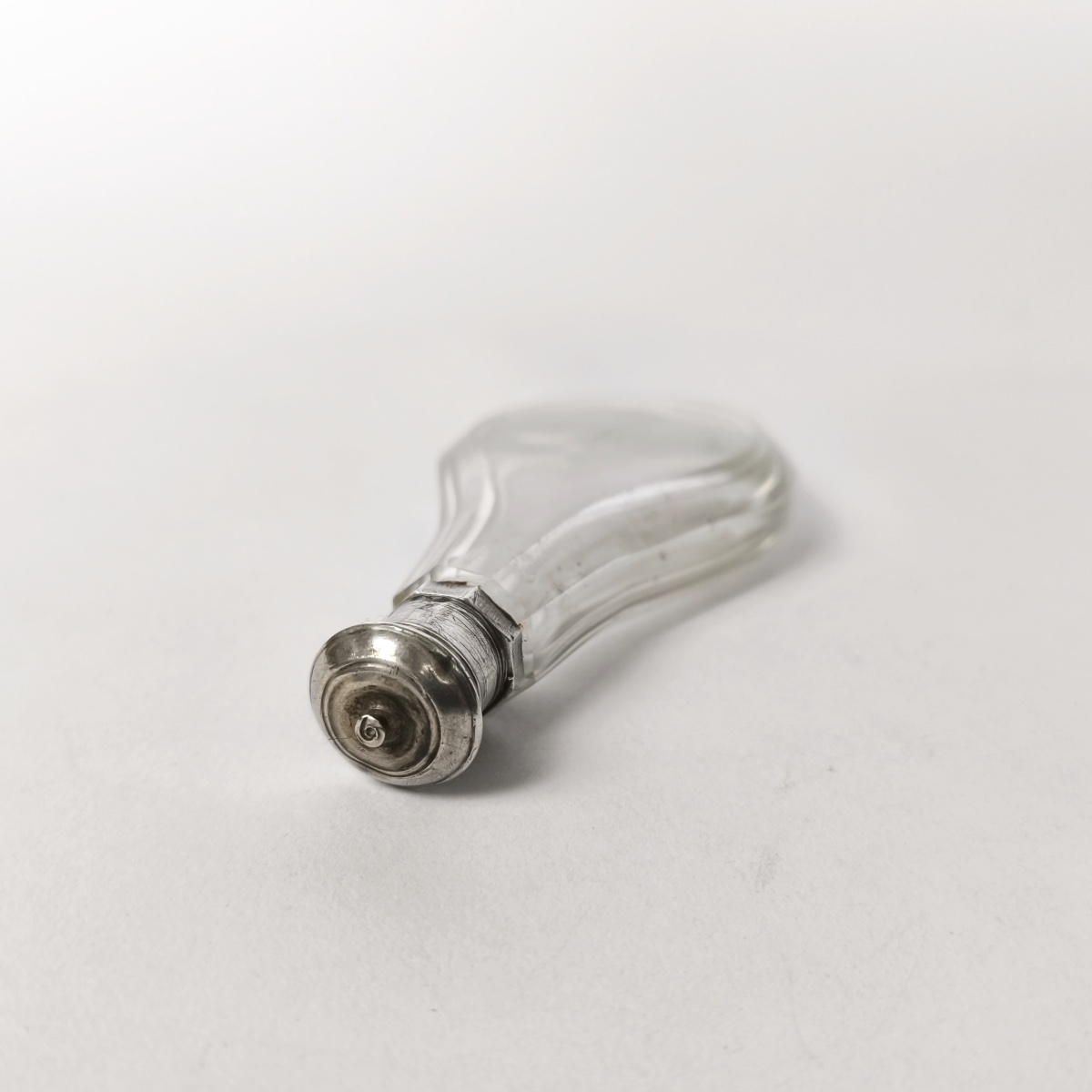 An 18th-century Perfume Bottle Made Of Glass And Solid Silver. 
