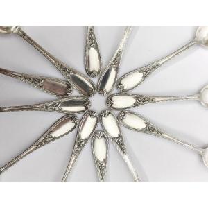 Louis Coignet : 12 cuillères à dessert en argent massif, décor laurier néoclassique / Louis XVI