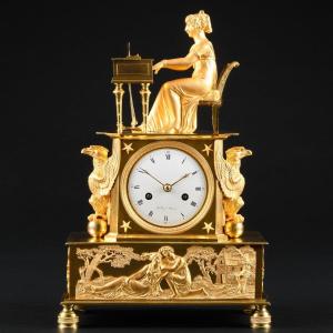 Sublime Gilt Bronze Empire Clock “ L’épinettiste ”