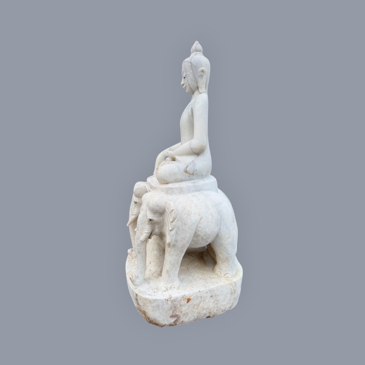 Marble Buddha Sculpture Seated On A Throne Of Elephants-photo-2
