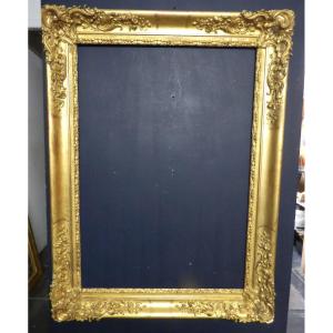 Grand cadre en bois et stuc doré époque 19ème