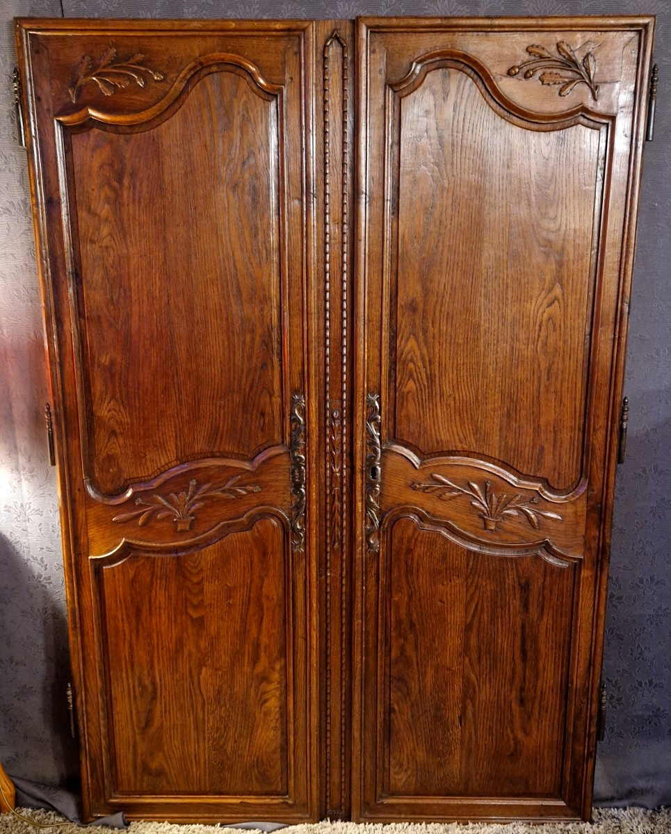 Paire de portes en chêne sculpté XIXe