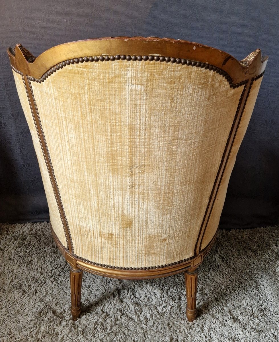Fauteuil bergère en bois doré XIXe-photo-3