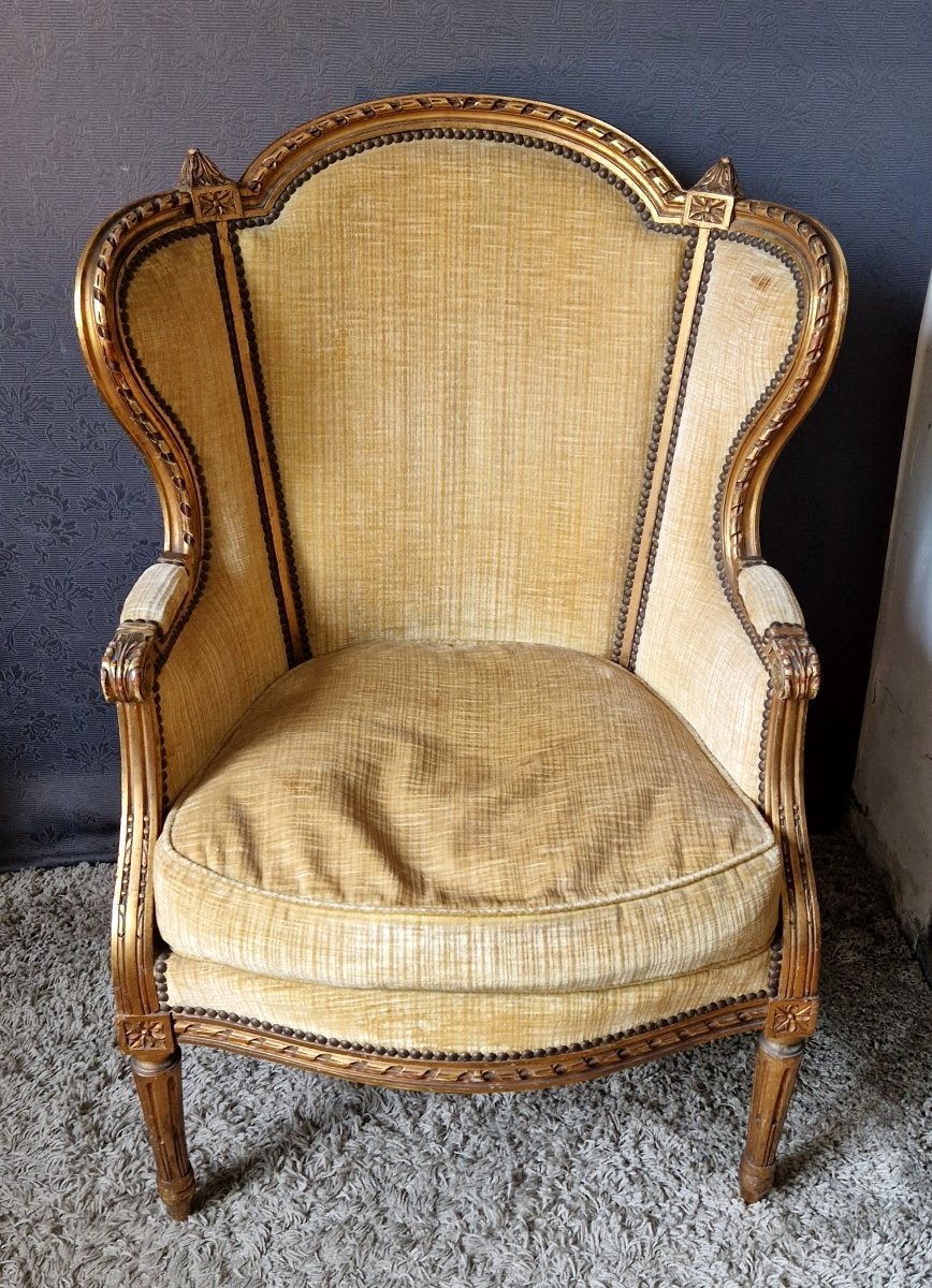 Fauteuil bergère en bois doré XIXe