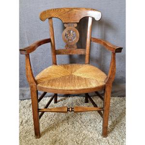 Fauteuil paillé XIXe en Chêne