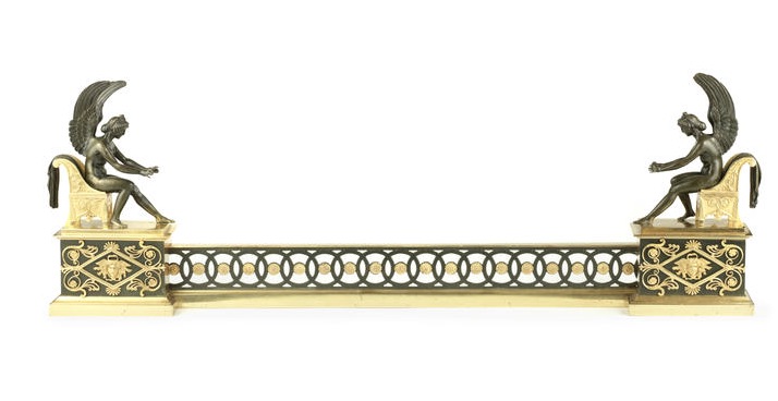 An Empire Ormolu And Patinated Bronze Fire Fender
